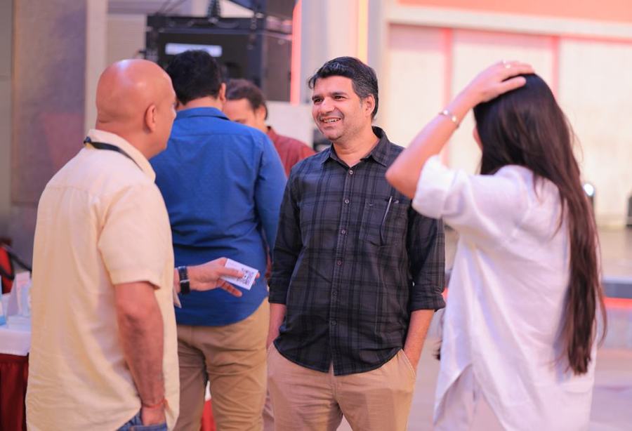 Attendees talking between sessions